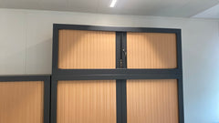 Armoire basse avec portes coulissantes - face