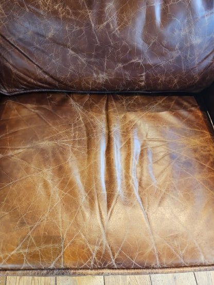 Fauteuil en cuir avec accoudoirs