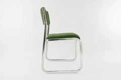 Chaise traineau en métal chromé tissu vert