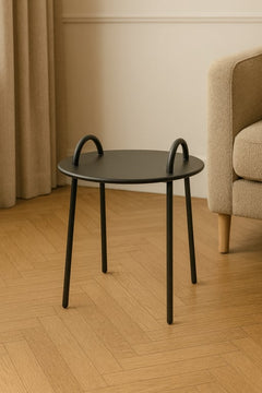 Table basse ronde en métal noir