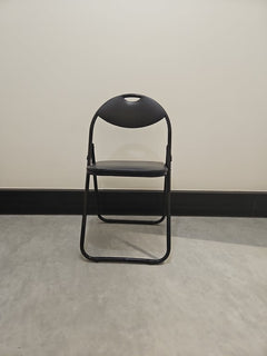 Chaise de réunion noire en simili-cuir avec piètement luge